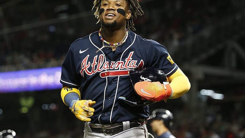 Sep 22, 2023; Washington, District of Columbia, USA; Atlanta Braves right fielder Ronald Acuna Jr. (13) celebrates after scoring a run in the fifth inning against the Washington Nationals at Nationals Park. Mandatory Credit: Amber Searls-USA TODAY Sports