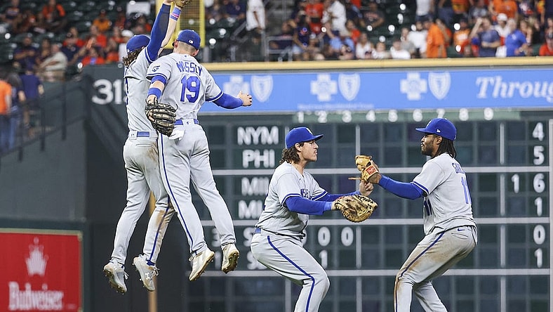 Sep 22, 2023; Houston, Texas, USA; Kansas City Royals first baseman Nick Pratto (32) and second baseman Michael Massey (19) leap to celebrate after the game against the Houston Astros at Minute Maid Park. Mandatory Credit: Troy Taormina-USA TODAY Sports
