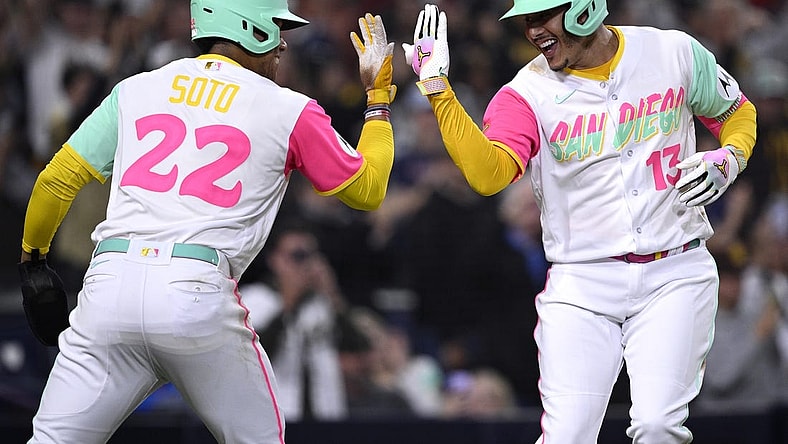 Sep 22, 2023; San Diego, California, USA; San Diego Padres designated hitter Manny Machado (13) celebrates with left fielder Juan Soto (22) after hitting a two-run home run against the St. Louis Cardinals during the eighth inning at Petco Park. Mandatory Credit: Orlando Ramirez-USA TODAY Sports