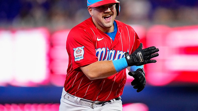 Sep 23, 2023; Miami, Florida, USA; Miami Marlins third baseman Jake Burger (36) celebrates hitting a three run home run against the Milwaukee Brewers during the first inning at loanDepot Park. Mandatory Credit: Rich Storry-USA TODAY Sports