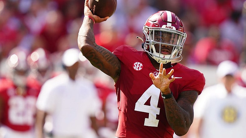 Sep 23, 2023; Tuscaloosa, Alabama, USA; Alabama Crimson Tide quarterback Jalen Milroe (4) looks to pass against the Mississippi Rebels during the first quarter at Bryant-Denny Stadium. Mandatory Credit: John David Mercer-USA TODAY Sports