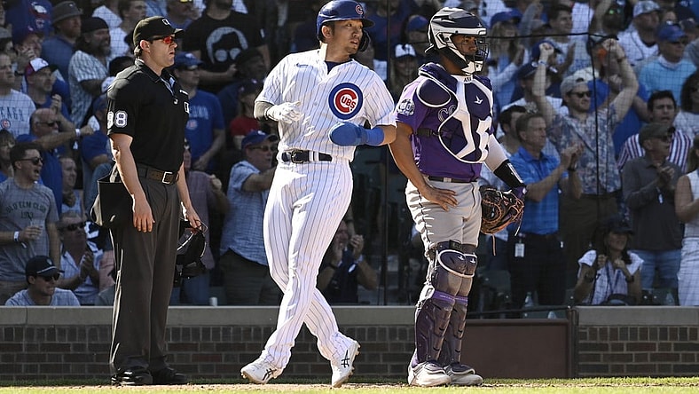 Sep 23, 2023; Chicago, Illinois, USA; Chicago Cubs right fielder Seiya Suzuki (27) scores against the Colorado Rockies during the sixth inning at Wrigley Field. Mandatory Credit: Matt Marton-USA TODAY Sports