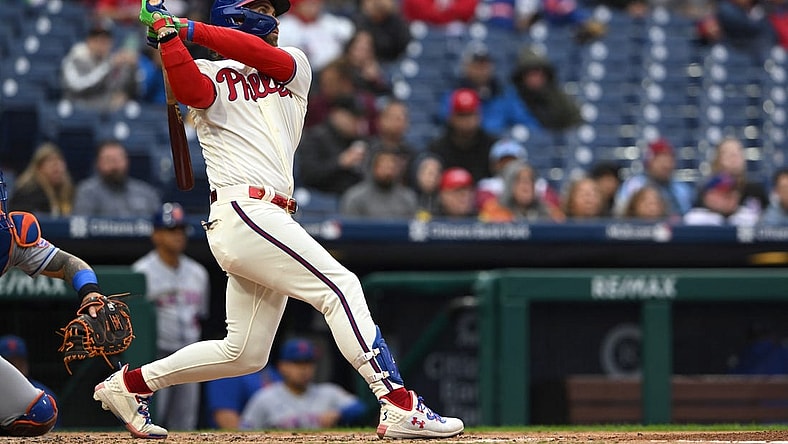 Sep 23, 2023; Philadelphia, Pennsylvania, USA;  Philadelphia Phillies designated hitter Bryce Harper (3) hits a solo home run in the second inning against the New York Mets at Citizens Bank Park. Mandatory Credit: John Geliebter-USA TODAY Sports