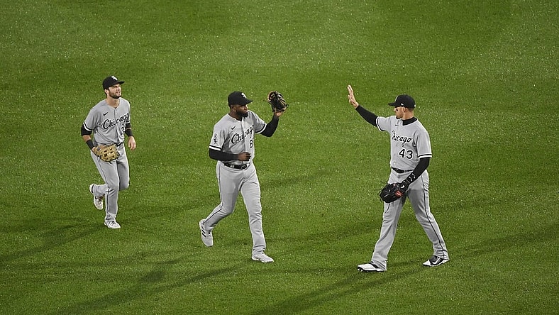 Sep 23, 2023; Boston, Massachusetts, USA;  Chicago White Sox center fielder Trayce Thompson (43) high fives center fielder Luis Robert Jr. (88) after defeating the Boston Red Sox at Fenway Park. Mandatory Credit: Bob DeChiara-USA TODAY Sports