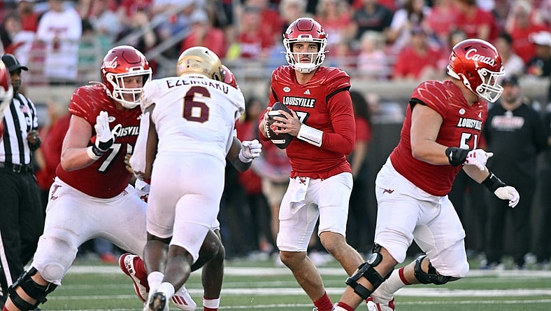Sep 23, 2023; Louisville, Kentucky, USA;  Louisville Cardinals quarterback Jack Plummer (13) looks to pass againt the Boston College Eagles during the second half at L&N Federal Credit Union Stadium. Louisville defeated Boston College 56-28. Mandatory Credit: Jamie Rhodes-USA TODAY Sports