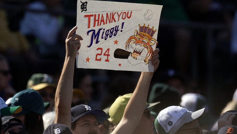 Sep 23, 2023; Oakland, California, USA; A fan holds up a sign acknowledging Detroit Tigers designated hitter Miguel Cabrera during the eighth inning against the Oakland Athletics at Oakland-Alameda County Coliseum. Cabrera is retiring after 21 Major League seasons. Mandatory Credit: D. Ross Cameron-USA TODAY Sports