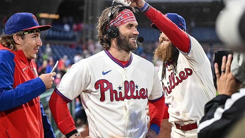 Sep 23, 2023; Philadelphia, Pennsylvania, USA;  Philadelphia Phillies center fielder Brandon Marsh and  second baseman Bryson Stott harass designated hitter Bryce Harper during a post game interview after the game against the New York Mets at Citizens Bank Park. Philadelphia won 7-5. Mandatory Credit: John Geliebter-USA TODAY Sports