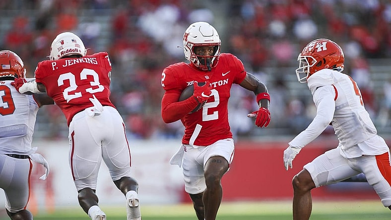 Sep 23, 2023; Houston, Texas, USA; Houston Cougars wide receiver Matthew Golden (2) runs with the ball during the first quarter against the Sam Houston State Bearkats at TDECU Stadium. Mandatory Credit: Troy Taormina-USA TODAY Sports