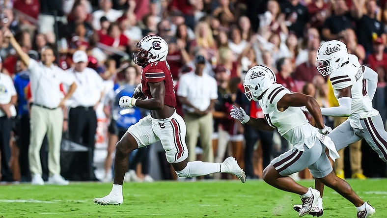 Sep 23, 2023; Columbia, South Carolina, USA; South Carolina Gamecocks wide receiver Xavier Legette (17) scores on a 76-yard touchdown reception against the Mississippi State Bulldogs in the first quarter at Williams-Brice Stadium. Mandatory Credit: Jeff Blake-USA TODAY Sports