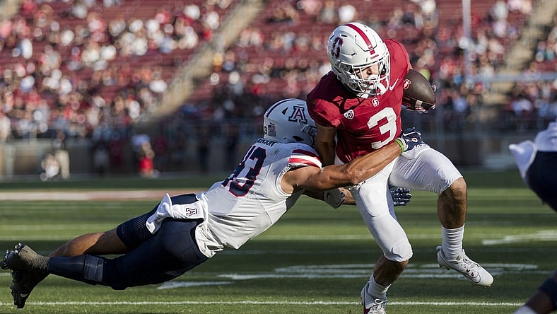 Sep 23, 2023; Stanford, California, USA; Arizona Wildcats safety Dalton Johnson (43) defends as Stanford Cardinal wide receiver Bryce Farrell (3) runs the ball for a touchdown against the Arizona Wildcats during the second quarter at Stanford Stadium. Mandatory Credit: John Hefti-USA TODAY Sports