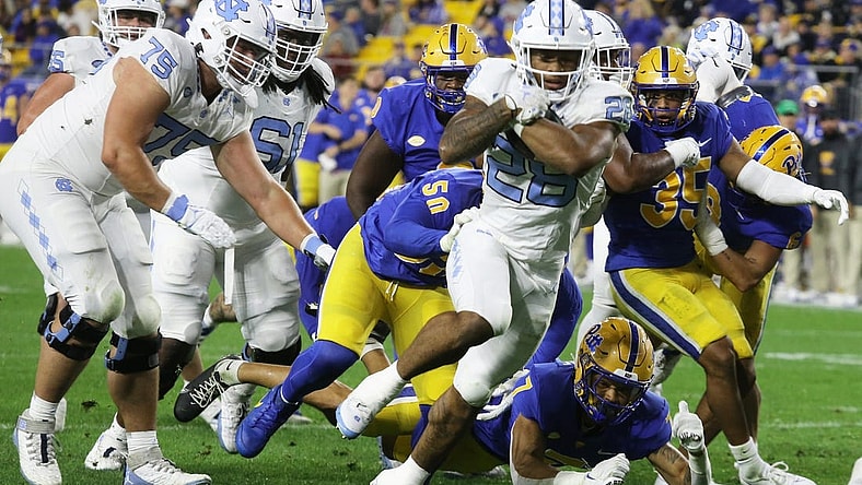 Sep 23, 2023; Pittsburgh, Pennsylvania, USA; North Carolina Tar Heels running back Omarion Hampton (28) crosses the goal line to score a touchdown against the Pittsburgh Panthers during the first quarter at Acrisure Stadium. Mandatory Credit: Charles LeClaire-USA TODAY Sports