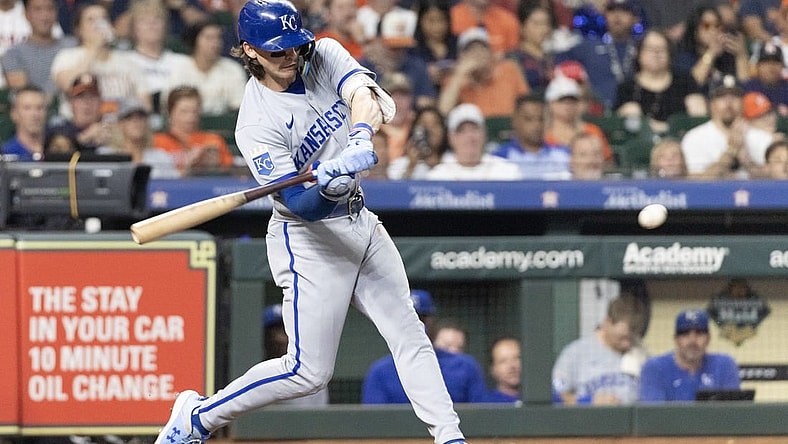 Sep 23, 2023; Houston, Texas, USA; Kansas City Royals shortstop Bobby Witt Jr. (7) hits a single against the Houston Astros in the fifth inning at Minute Maid Park. Mandatory Credit: Thomas Shea-USA TODAY Sports