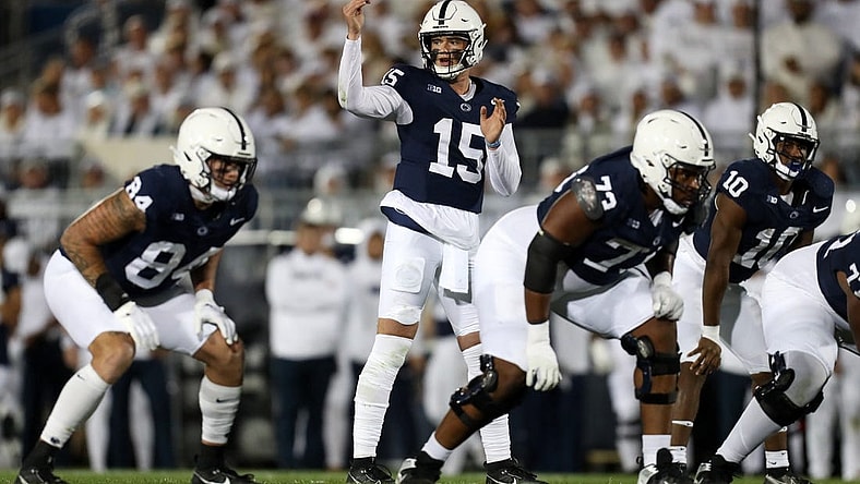 Sep 23, 2023; University Park, Pennsylvania, USA; Penn State Nittany Lions quarterback Drew Allar (15) gestures from the line of scrimmage during the first quarter against the Iowa Hawkeyes at Beaver Stadium. Mandatory Credit: Matthew O'Haren-USA TODAY Sports