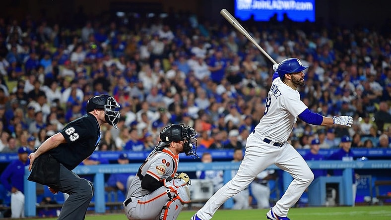 Sep 23, 2023; Los Angeles, California, USA; Los Angeles Dodgers designated hitter J.D. Martinez (28) hits a two run RBI double against the San Francisco Giants during the third inning at Dodger Stadium. Mandatory Credit: Gary A. Vasquez-USA TODAY Sports