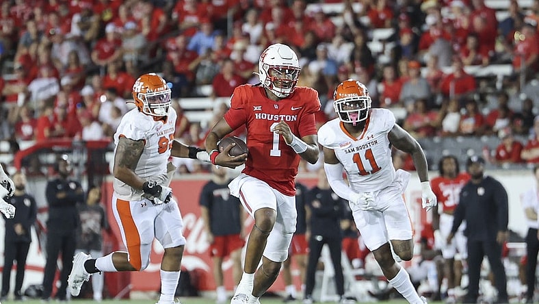 Sep 23, 2023; Houston, Texas, USA; Houston Cougars quarterback Donovan Smith (1) runs with the ball during the third quarter against the Sam Houston State Bearkats at TDECU Stadium. Mandatory Credit: Troy Taormina-USA TODAY Sports