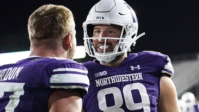 Sep 23, 2023; Evanston, Illinois, USA; Northwestern Wildcats tight end Charlie Mangieri (89) celebrates his game winning touchdown in overtime against the Minnesota Golden Gophers during the second half at Ryan Field. Mandatory Credit: David Banks-USA TODAY Sports