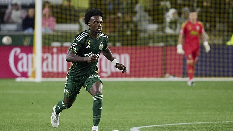 Sep 23, 2023; Portland, Oregon, USA; Portland Timbers midfielder Santiago Moreno (30) controls the ball during the second half against the Colorado Rapids at Providence Park. Mandatory Credit: Troy Wayrynen-USA TODAY Sports