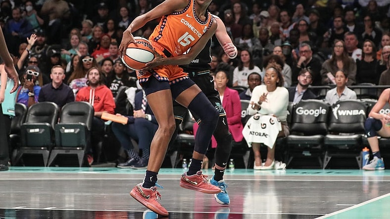 Sep 24, 2023; Brooklyn, New York, USA; Connecticut Sun guard Tiffany Hayes (15) drives to the basket in the second quarter against the New York Liberty during game one of the 2023 WNBA Playoffs at Barclays Center. Mandatory Credit: Wendell Cruz-USA TODAY Sports