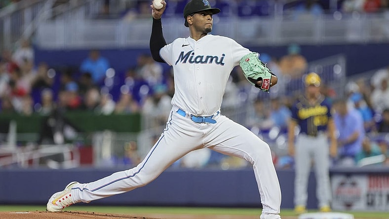 Sep 24, 2023; Miami, Florida, USA; Miami Marlins starting pitcher Edward Cabrera (27) delivers a pitch against the Milwaukee Brewers during the first inning at loanDepot Park. Mandatory Credit: Sam Navarro-USA TODAY Sports