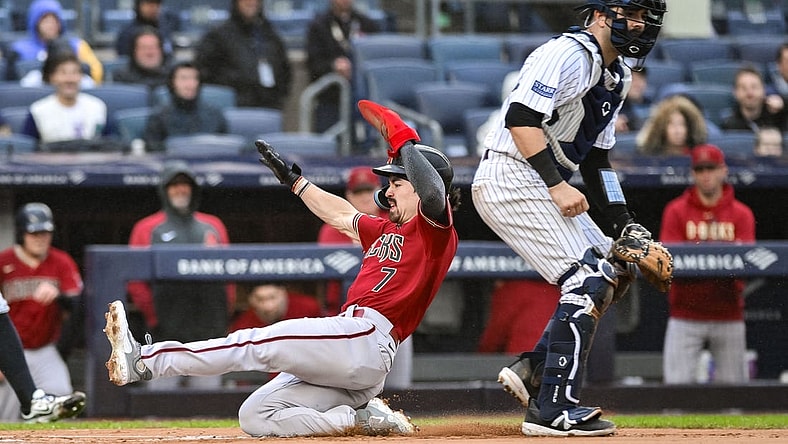 Sep 24, 2023; Bronx, New York, USA; Arizona Diamondbacks left fielder Corbin Carroll (7) scores on a sacrifice fly by first baseman Christian Walker (not pictured) during the first inning against the New York Yankees at Yankee Stadium. Mandatory Credit: John Jones-USA TODAY Sports