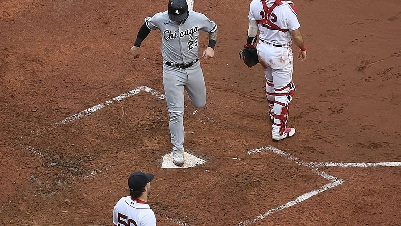 Sep 24, 2023; Boston, Massachusetts, USA; Chicago White Sox catcher Korey Lee (26) scores a run during the fifth inning against the Boston Red Sox at Fenway Park. Mandatory Credit: Bob DeChiara-USA TODAY Sports