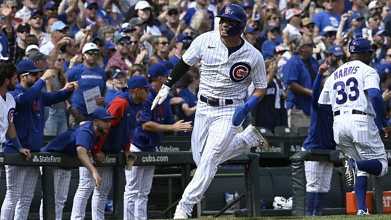 Sep 24, 2023; Chicago, Illinois, USA;  Chicago Cubs right fielder Seiya Suzuki (27) heads to home plate to score against the Colorado Rockies during the second inning at Wrigley Field. Mandatory Credit: Matt Marton-USA TODAY Sports