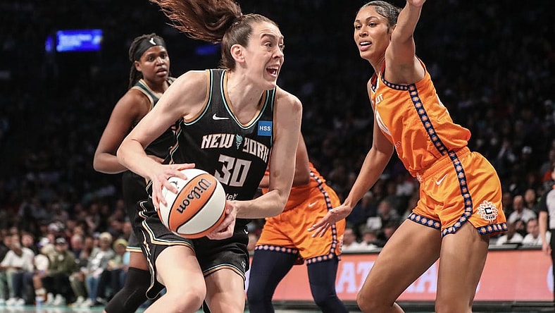 Sep 24, 2023; Brooklyn, New York, USA; New York Liberty forward Breanna Stewart (30) looks to drive past Connecticut Sun forward Olivia Nelson-Ododa (10) in the fourth quarter during game one of the 2023 WNBA Playoffs at Barclays Center. Mandatory Credit: Wendell Cruz-USA TODAY Sports