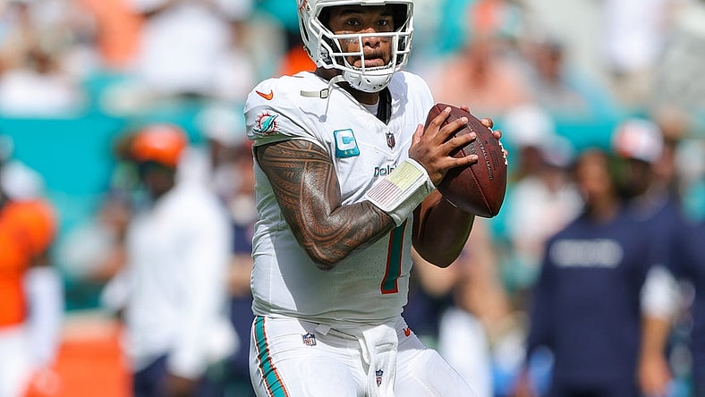 Sep 24, 2023; Miami Gardens, Florida, USA;  Miami Dolphins quarterback Tua Tagovailoa (1) drops back to pass against the Denver Broncos in the third quarter at Hard Rock Stadium. Mandatory Credit: Nathan Ray Seebeck-USA TODAY Sports