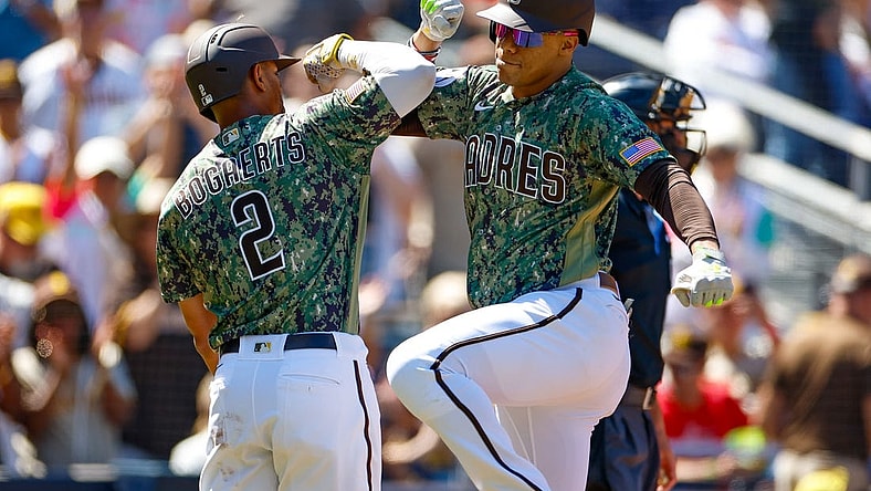 Sep 24, 2023; San Diego, California, USA; San Diego Padres left fielder Juan Soto (22) celebrates with San Diego Padres designated hitter Xander Bogaerts (2) after hitting a three run home run in the first inning against the St. Louis Cardinals at Petco Park. Mandatory Credit: David Frerker-USA TODAY Sports