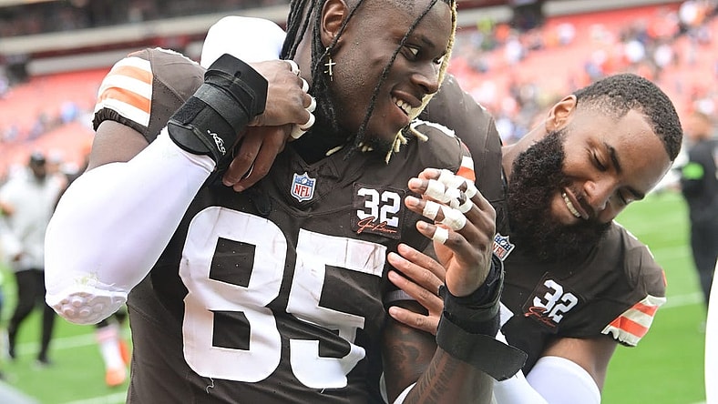 Sep 24, 2023; Cleveland, Ohio, USA; Cleveland Browns tight end David Njoku (85) and linebacker Anthony Walker Jr. (5) celebrate after the Browns beat the Tennessee Titans at Cleveland Browns Stadium. Mandatory Credit: Ken Blaze-USA TODAY Sports