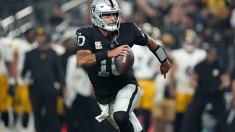 Sep 24, 2023; Paradise, Nevada, USA; Las Vegas Raiders quarterback Jimmy Garoppolo (10) throws the ball against the Pittsburgh Steelers in the second half at Allegiant Stadium. Mandatory Credit: Kirby Lee-USA TODAY Sports