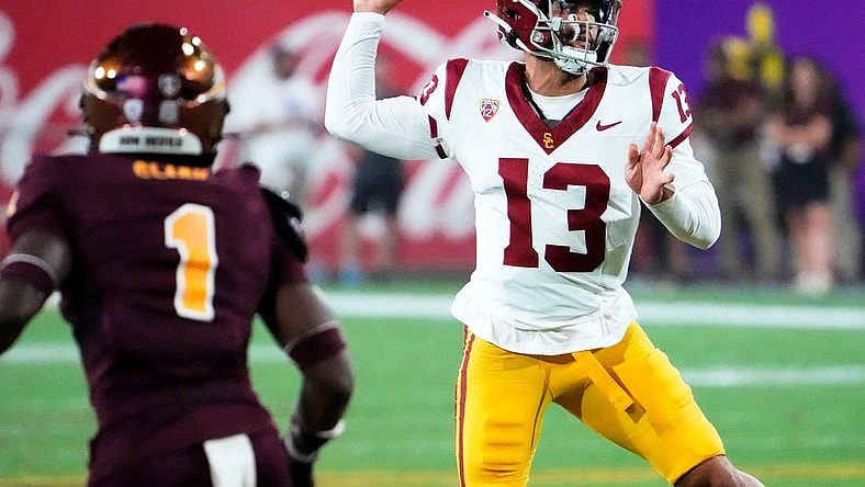 USC Trojans quarterback Caleb Williams (13) throws a pass against the Arizona State Sun Devils in the first half at Mountain America Stadium in Tempe on Sept. 23, 2023.