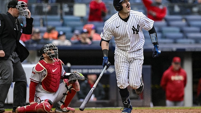Sep 25, 2023; Bronx, New York, USA; New York Yankees catcher Austin Wells (88) hits a two run home run against the Arizona Diamondbacks during the fourth inning at Yankee Stadium. Mandatory Credit: John Jones-USA TODAY Sports
