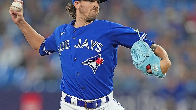 Sep 26, 2023; Toronto, Ontario, CAN; Toronto Blue Jays starting pitcher Kevin Gausman (34) throws a pitch against the New York Yankees during the first inning at Rogers Centre. Mandatory Credit: Nick Turchiaro-USA TODAY Sports