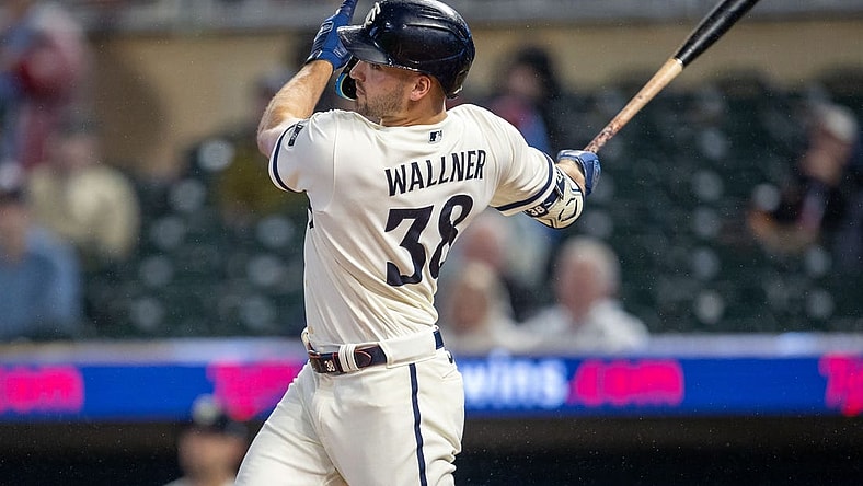 Sep 26, 2023; Minneapolis, Minnesota, USA; Minnesota Twins left fielder Matt Wallner (38) hits a grand slam against the Oakland Athletics in the first inning at Target Field. Mandatory Credit: Jesse Johnson-USA TODAY Sports