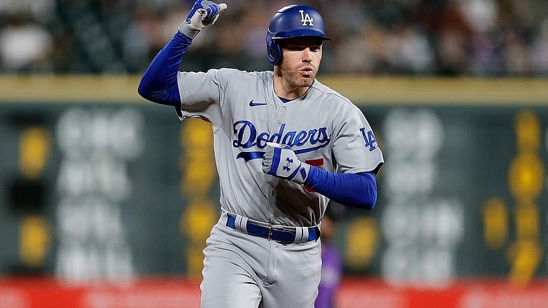 Sep 26, 2023; Denver, Colorado, USA; Los Angeles Dodgers first baseman Freddie Freeman (5) gestures as he rounds the bases on a solo home run in the sixth inning against the Colorado Rockies at Coors Field. Mandatory Credit: Isaiah J. Downing-USA TODAY Sports