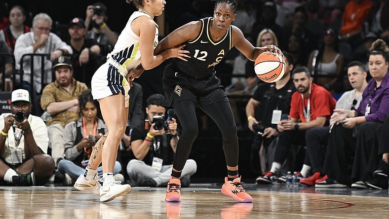 Sep 26, 2023; Las Vegas, Nevada, USA; Las Vegas Aces guard Chelsea Gray (12) is guarded by Dallas Wings guard Veronica Burton (12) in the first half of game two of the 2023 WNBA Playoffs at Michelob Ultra Arena. Mandatory Credit: Candice Ward-USA TODAY Sports