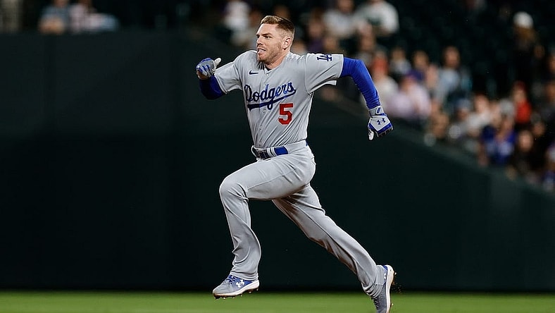 Sep 26, 2023; Denver, Colorado, USA; Los Angeles Dodgers first baseman Freddie Freeman (5) runs to second on a double in the ninth inning against the Colorado Rockies at Coors Field. Mandatory Credit: Isaiah J. Downing-USA TODAY Sports