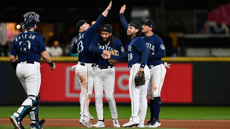 Sep 26, 2023; Seattle, Washington, USA; The Seattle Mariners celebrate defeating the Houston Astros at T-Mobile Park. Mandatory Credit: Steven Bisig-USA TODAY Sports