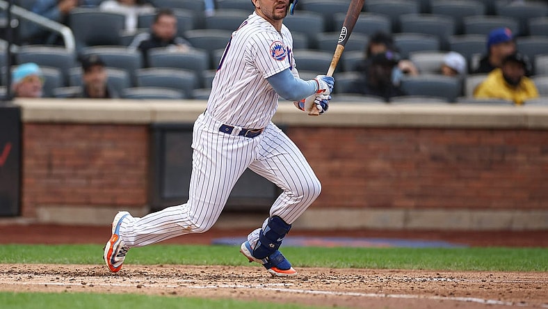 Sep 27, 2023; New York City, New York, USA; New York Mets first baseman Pete Alonso (20) doubles during the sixth inning against the Miami Marlins at Citi Field. Mandatory Credit: Vincent Carchietta-USA TODAY Sports