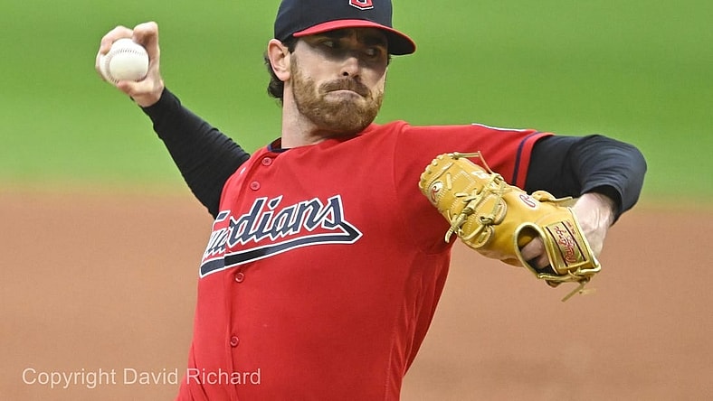 Sep 27, 2023; Cleveland, Ohio, USA; Cleveland Guardians starting pitcher Shane Bieber (57) delivers a pitch in the first inning against the Cincinnati Reds at Progressive Field. Mandatory Credit: David Richard-USA TODAY Sports