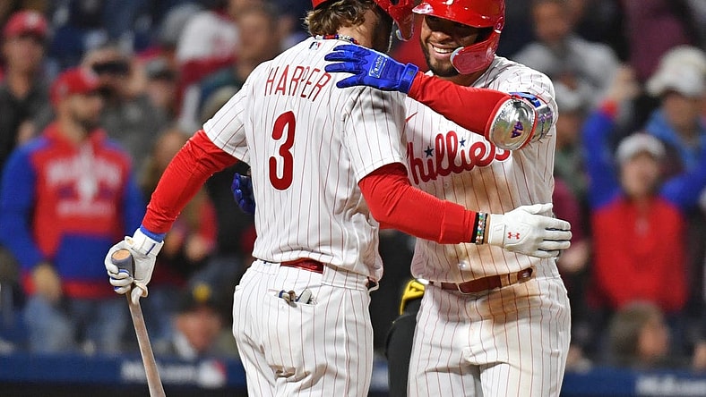 Sep 27, 2023; Philadelphia, Pennsylvania, USA; Philadelphia Phillies third baseman Edmundo Sosa (33) celebrates his home run with designated hitter Bryce Harper (3) during the fifth inning against the Pittsburgh Pirates at Citizens Bank Park. Mandatory Credit: Eric Hartline-USA TODAY Sports