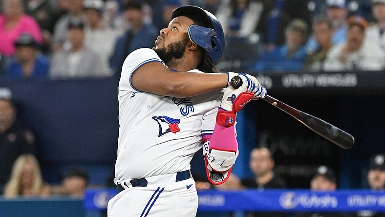 Sep 27, 2023; Toronto, Ontario, CAN; Toronto Blue Jays first baseman Vladimir Guerrero Jr. (27) loses his batting helmet as he pops out against the New York Yankees in the first inning at Rogers Centre. Mandatory Credit: Dan Hamilton-USA TODAY Sports