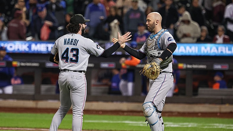 Sep 27, 2023; New York, NY, USA; Miami Marlins relief pitcher Andrew Nardi (43) celebrates with catcher Jacob Stallings (58) after defeating the New York Mets at Citi Field. Mandatory Credit: Vincent Carchietta-USA TODAY Sports