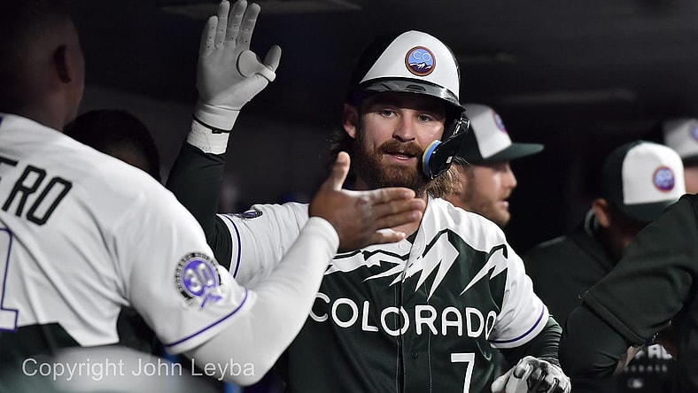 Sep 27, 2023; Denver, Colorado, USA; Colorado Rockies second baseman Brendan Rodgers (7) gets a high five from Elehuris Montero after his home run during the sixth inning against the Los Angeles Dodgers at Coors Field. Mandatory Credit: John Leyba-USA TODAY Sports