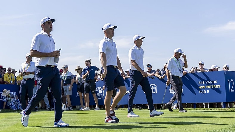 Sep 28, 2023; Rome, ITA; From left, Team USA golfers Scottie Scheffler, Justin Thomas, Jordan Spieth and Thomas    dad, Mike Thomas, walk the 12th hole during a practice day for the Ryder Cup golf competition at Marco Simone Golf and Country Club. Mandatory Credit: Adam Cairns-USA TODAY Sports