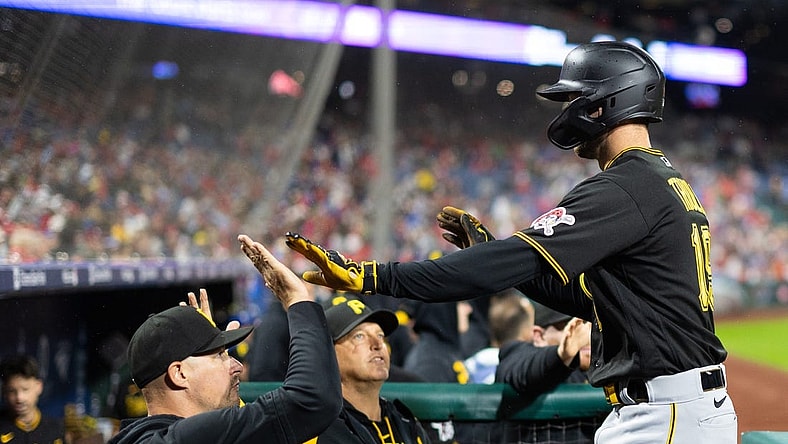 Sep 28, 2023; Philadelphia, Pennsylvania, USA; Pittsburgh Pirates third baseman Jared Triolo (19) is congratulated after scoring against the Philadelphia Phillies during the fifth inning at Citizens Bank Park. Mandatory Credit: Bill Streicher-USA TODAY Sports