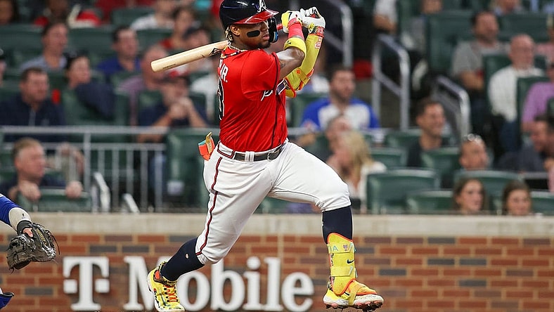 Sep 28, 2023; Atlanta, Georgia, USA; Atlanta Braves right fielder Ronald Acuna Jr. (13) hits a RBI single against the Chicago Cubs in the second inning at Truist Park. Mandatory Credit: Brett Davis-USA TODAY Sports