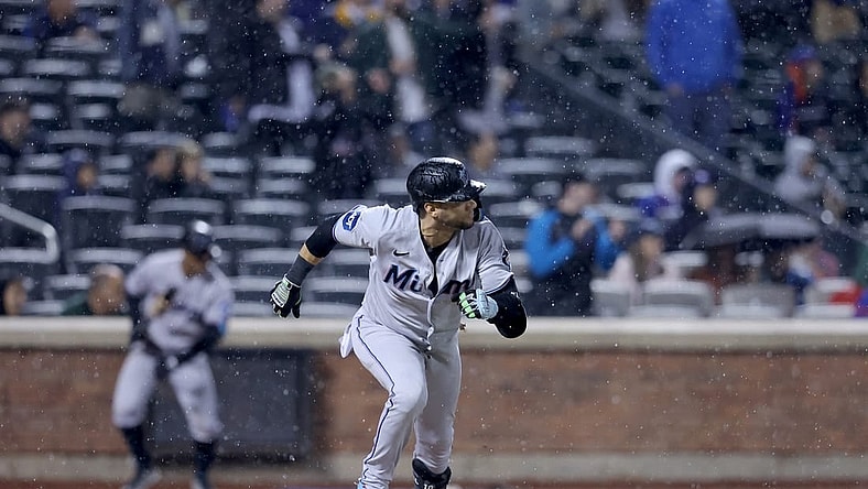 Sep 28, 2023; New York City, New York, USA; Miami Marlins pinch hitter Yuli Gurriel (10) runs out an RBI single against the New York Mets during the ninth inning at Citi Field. Mandatory Credit: Brad Penner-USA TODAY Sports