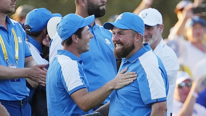 Sep 29, 2023; Rome, ITA; Team Europe golfer Viktor Hovland and golfer Tyrrell Hatton celebrate on the 18th hole during day one fourballs round for the 44th Ryder Cup golf competition at Marco Simone Golf and Country Club. Mandatory Credit: Adam Cairns-USA TODAY Sports